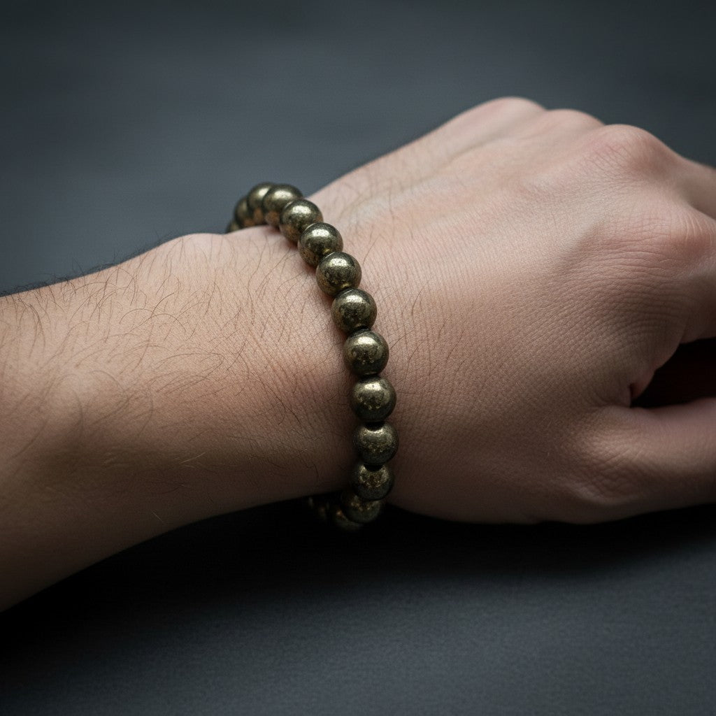 JewelOn 8mm Pyrite crystal bracelet with metallic gold lustre beads on a white background.