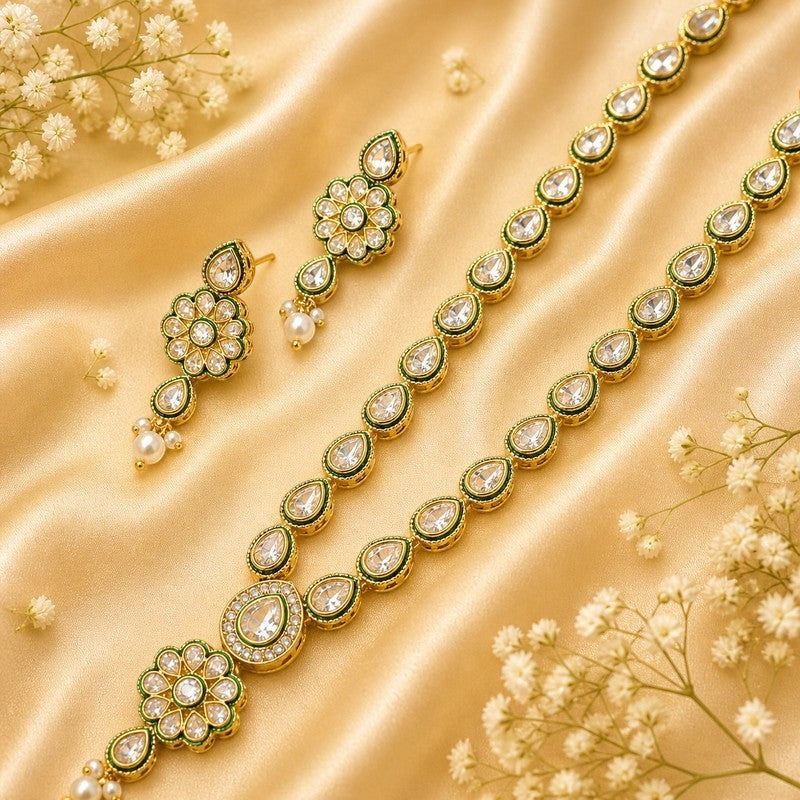 JewelOn Rangmahal AD long necklace set with matching earrings, featuring clear teardrop and round American diamonds with green enamel accents on a gold-toned base.
