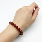 JewelOn bracelet with 8mm genuine red carnelian beads, elastic cord, for men and women.