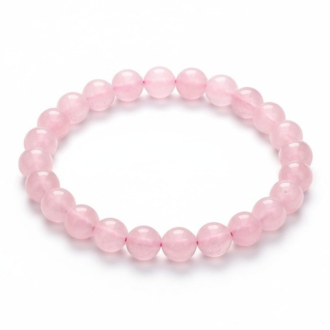 JewelOn bracelet with 8mm genuine Rose Quartz beads in a soft pink hue, strung on elastic cord.