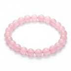 JewelOn bracelet with 8mm genuine Rose Quartz beads in a soft pink hue, strung on elastic cord.