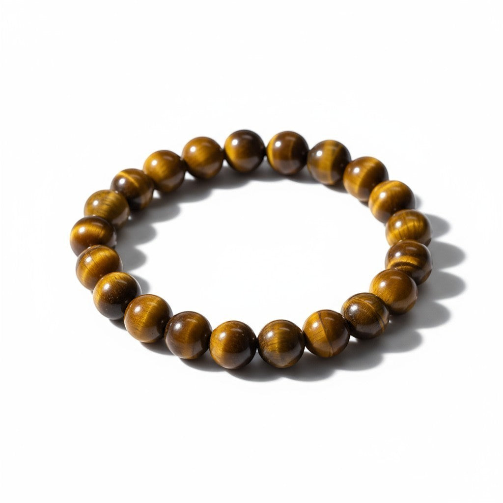 JewelOn bracelet with 8mm genuine Tiger Eye beads, featuring golden-brown chatoyancy and a shimmering cat's eye effect. Stretchy cord.