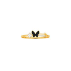 JewelOnHere gold-tone cuff bracelet with black enamel butterfly, white clover charm, and cubic zirconia.