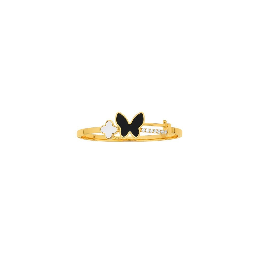 JewelOnHere gold-tone cuff bracelet with black enamel butterfly, white clover charm, and cubic zirconia.